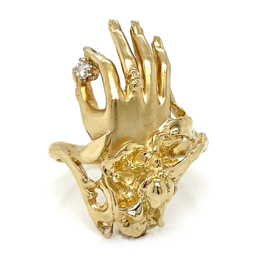 Hand Holding Diamond Ring