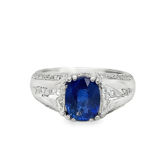 Oval Cut Sapphire & Flanked Triangular Diamond Ring