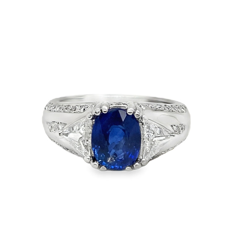Oval Cut Sapphire & Flanked Triangular Diamond Ring