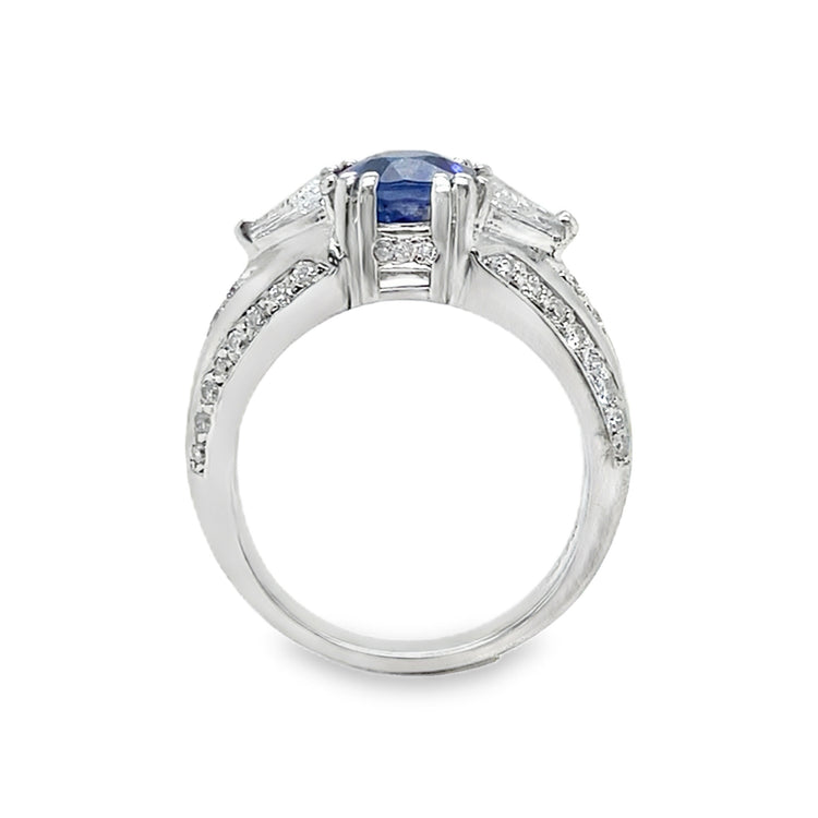 Oval Cut Sapphire & Flanked Triangular Diamond Ring