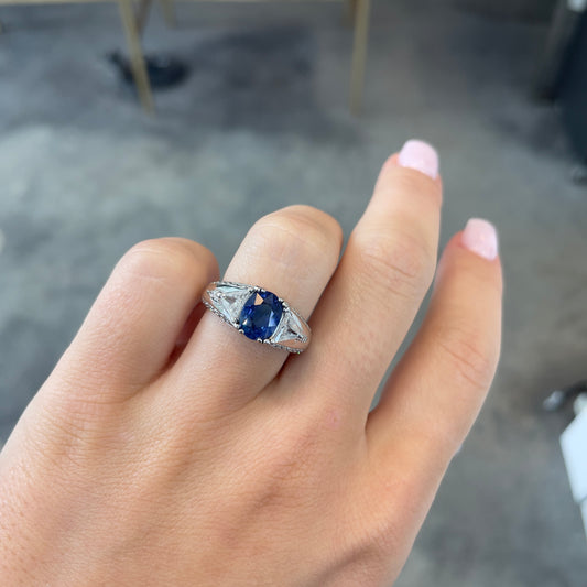 Oval Cut Sapphire & Flanked Triangular Diamond Ring